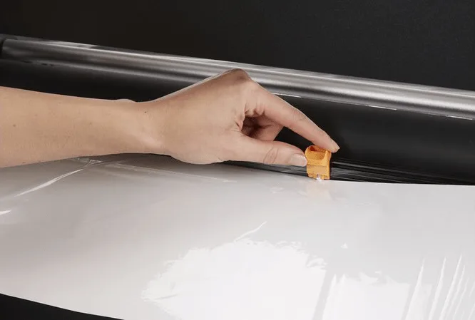 Trimming laminated school materials