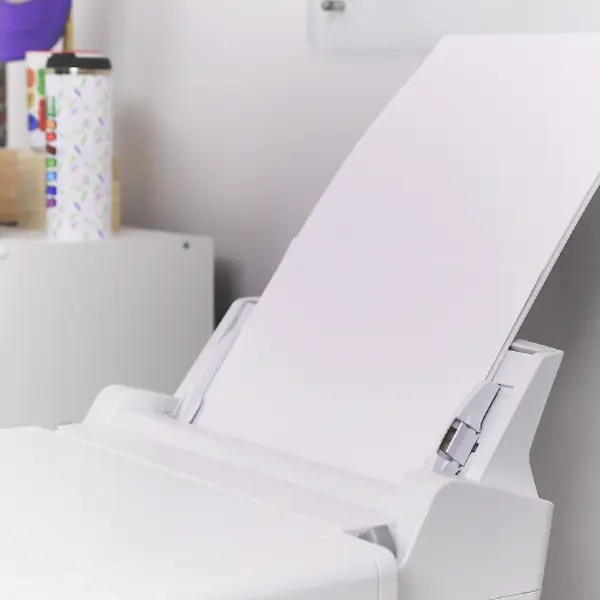 SG1000 VersiFlex sublimation printer with bypass tray loaded with paper for extended-size printing